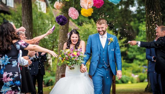 A newly wed couple outside Abbeywood Estate